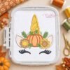 Thanksgiving unicorn machine embroidery design stitched in a white plastic hoop