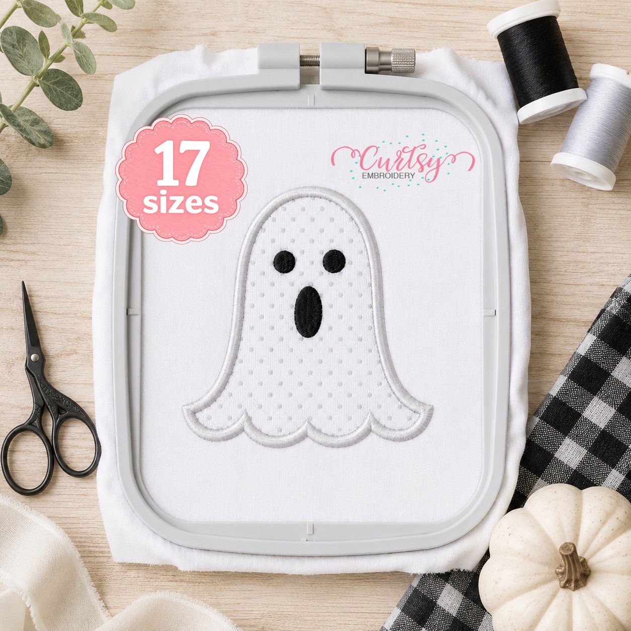 Ghost applique design stitched in a plastic machine embroidery hoop