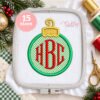 Christmas ornament applique embroidery design stitched in embroidery machine hoop with monogram
