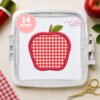 Red gingham apple applique embroidery design stitched in a white plastic machine embroidery hoop