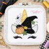 Halloween unicorn applique design stitched in a plastic machine embroidery hoop