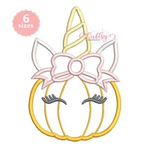 Embroidery software stitch simulation of unicorn pumpkin appliqué with gold pumpkin outlines, closed eyelash eyes, white ears, a pink bow, and a yellow spiral horn.