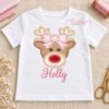 Open white shirt with girl reindeer face appliqué and the name Holly embroidered below