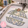 Split pumpkin monogram applique embroidery design being stitched on embroidery machine