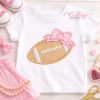 Football with bow quick stitch machine embroidery design on white fabric