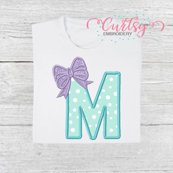 M Bow Monogram Applique Design M Bow Monogram Applique Design