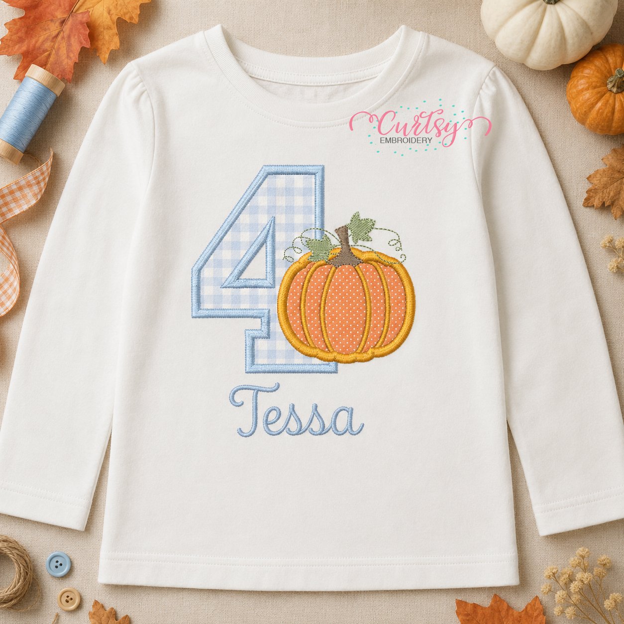 4th Birthday Pumpkin Applique Embroidery Design _ Logo 1 Toddler shirt mockup displaying the 4th Birthday Pumpkin Applique Embroidery Design with Tessa embroidered below.