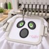 Ghost Face applique design being stitched in a multi-needle embroidery machine