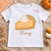 Pumpkin pie applique on an open white shirt with Penny embroidered below