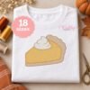 Pumpkin pie sketch fill embroidery design stitched on a folded white shirt
