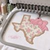 Texas with bow applique embroidery design stitching on multi needle embroidery machine
